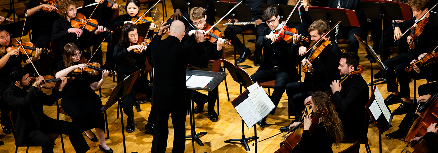 man playing acoustic guitar and piano closeup 